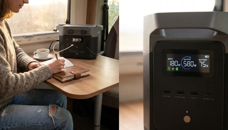 Estación de energía portátil EcoFlow DELTA 2 con batería LFP cargando un portátil y cámara en una mesa de camping al aire libre.